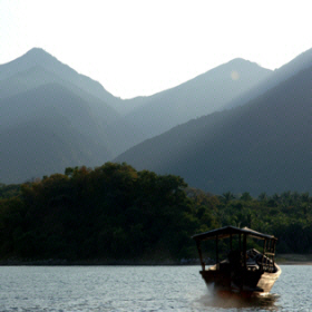 Dhow on Lake Tanganyika approaching Mahale Mountains National Park